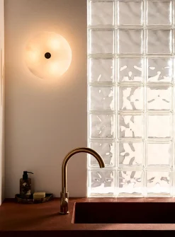 Alabaster saucer wall sconce