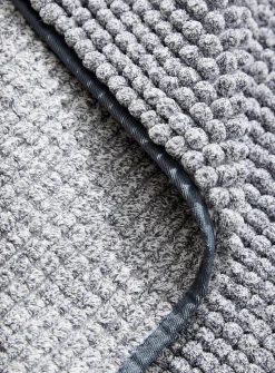 Bleached chenille bath mat