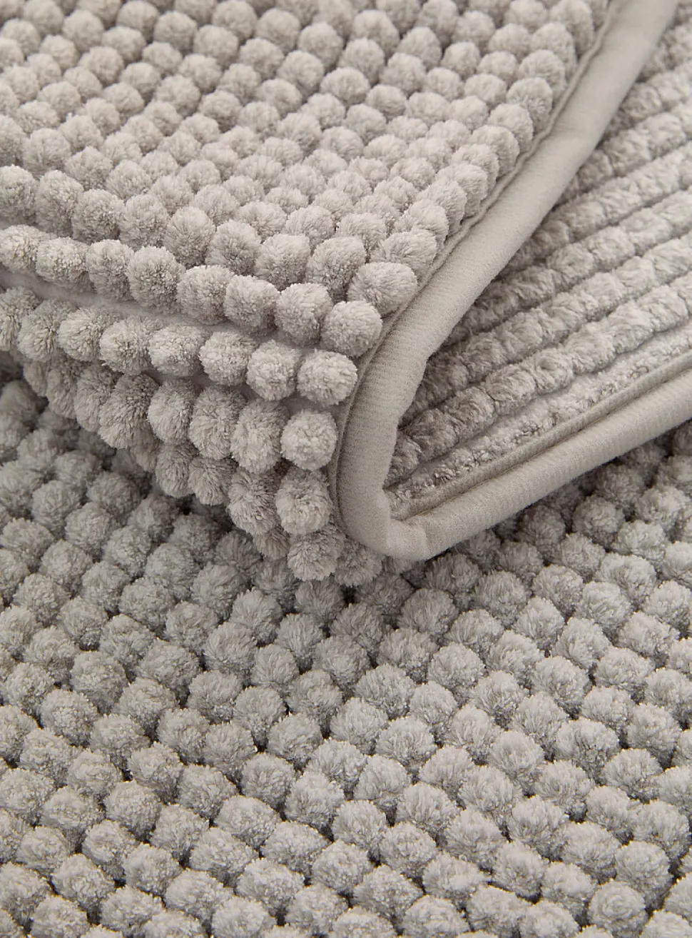 Bleached chenille bath mat