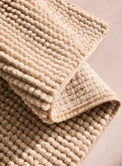 Bleached chenille bath mat
