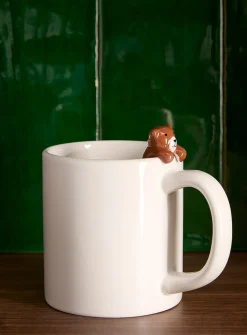 Climbing bear cub mug