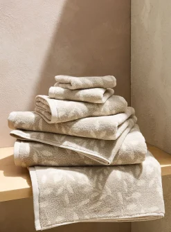 Contrasting leaves organic cotton reversible towels
