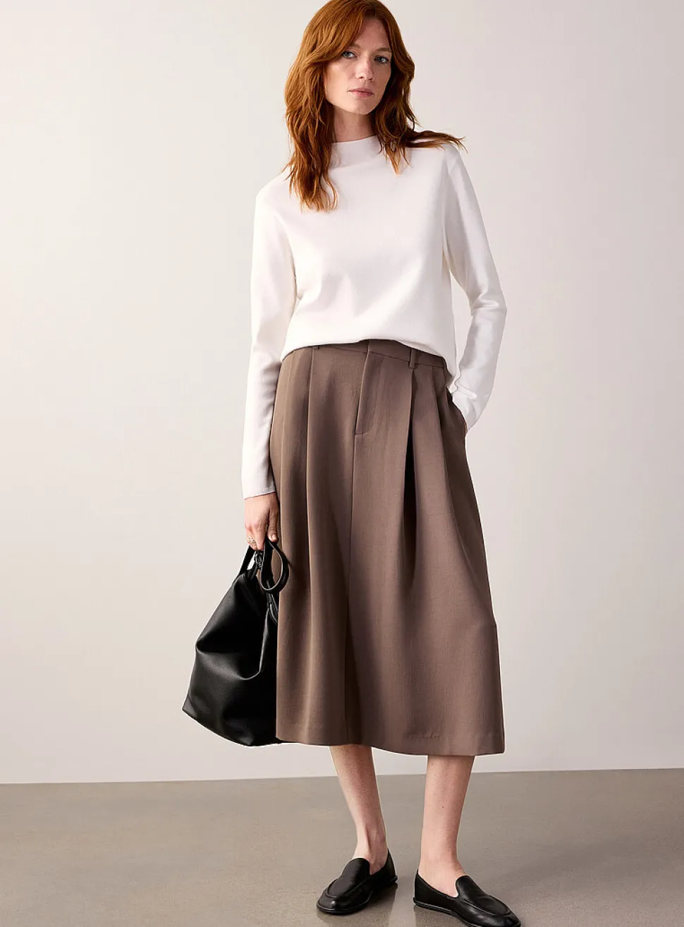 Flared textured crepe pleated skirt