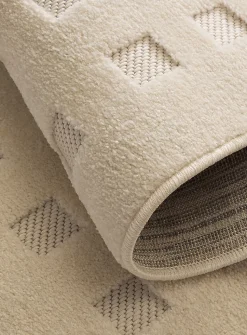 Flat-woven checkers ivory rug