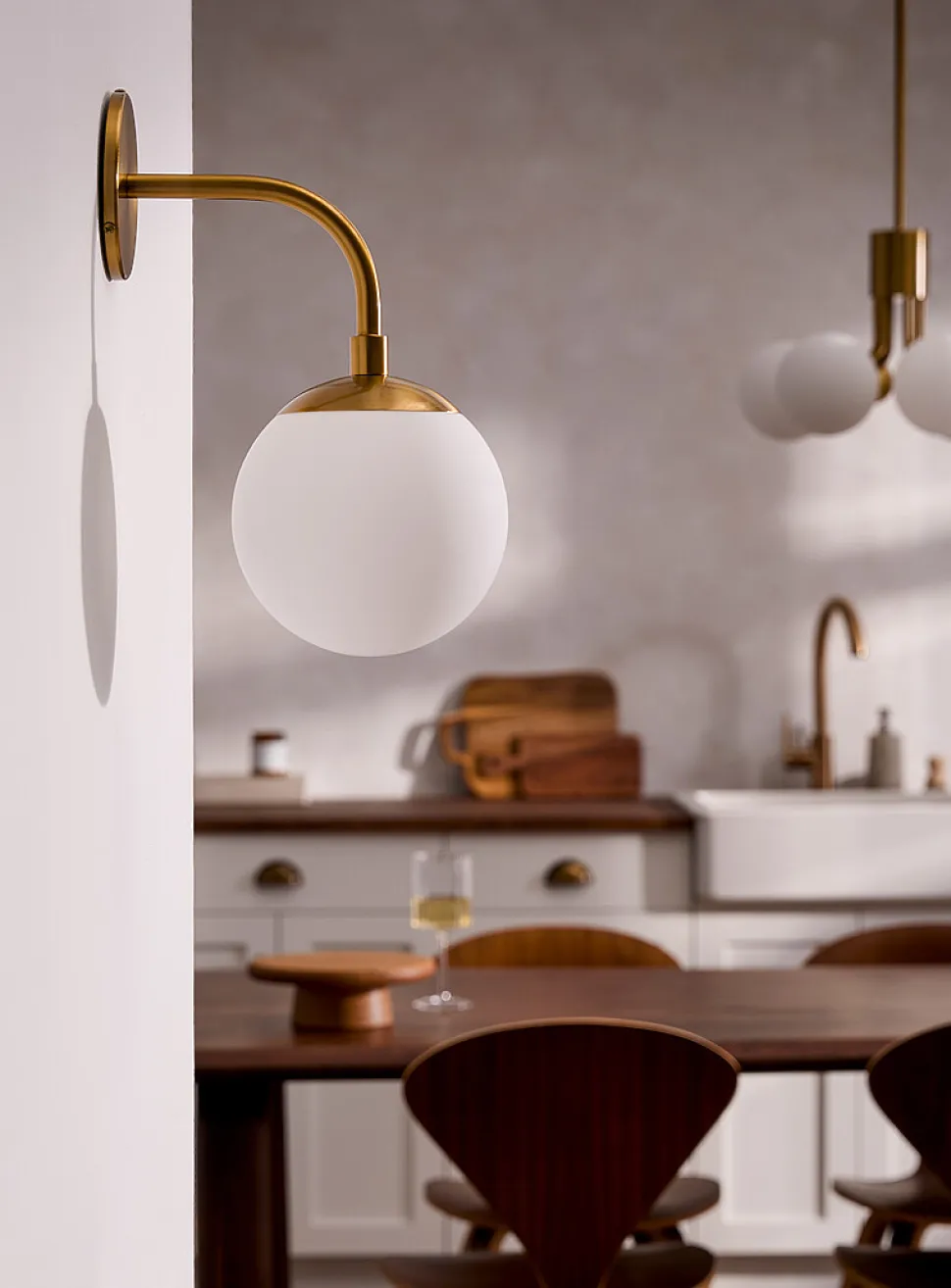 Golden opal celestial body sconce