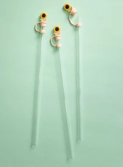 Large transparent straws with playful stoppers