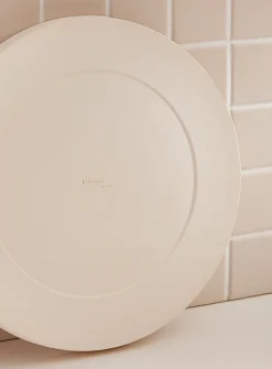 Large white glazed ceramic plate