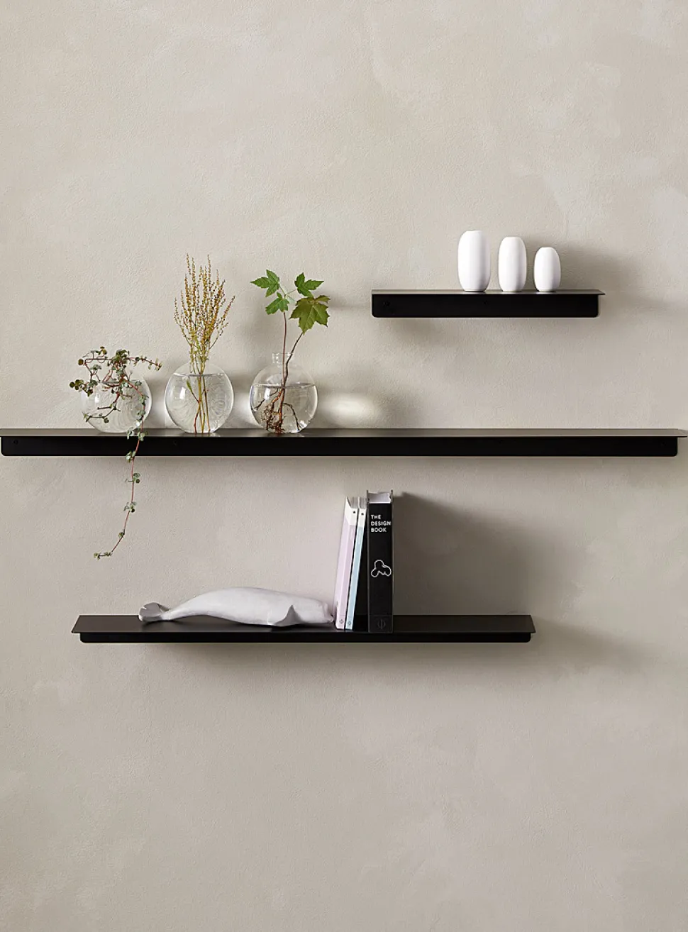 Minimalist steel wall shelf