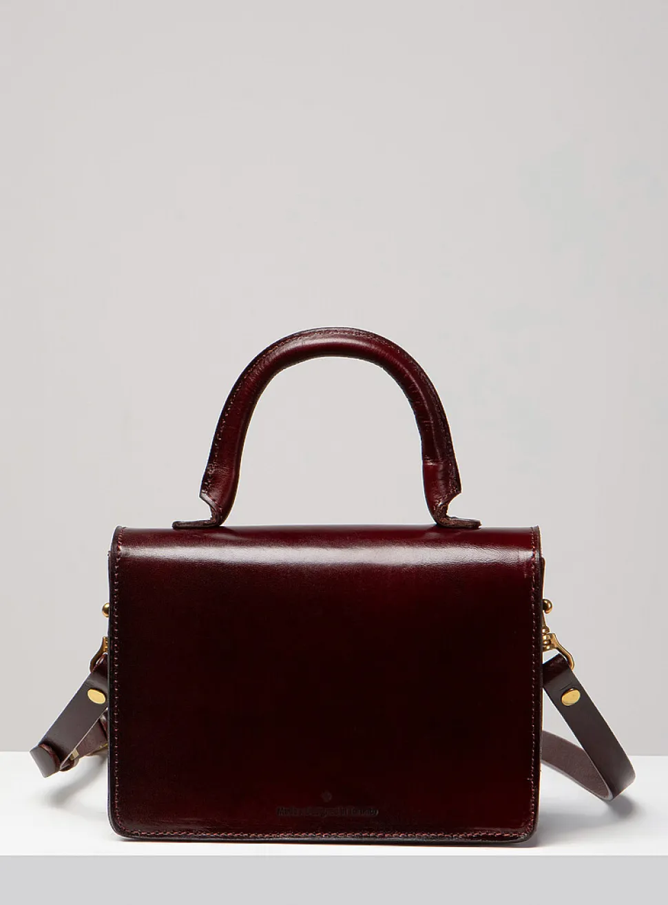 Minimalist Turn-loc closure handbag