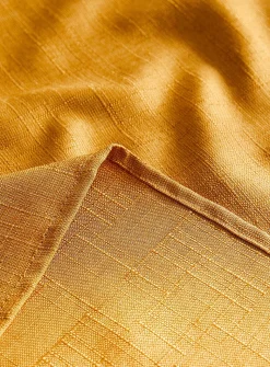 Mustard yellow textured tablecloth