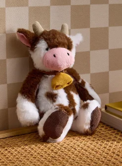 Plush cow with bell