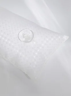 Polka dot bath cushion