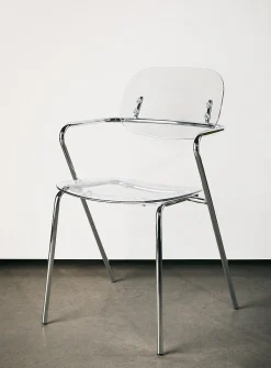 Polycarbonate and metal armrest chairs