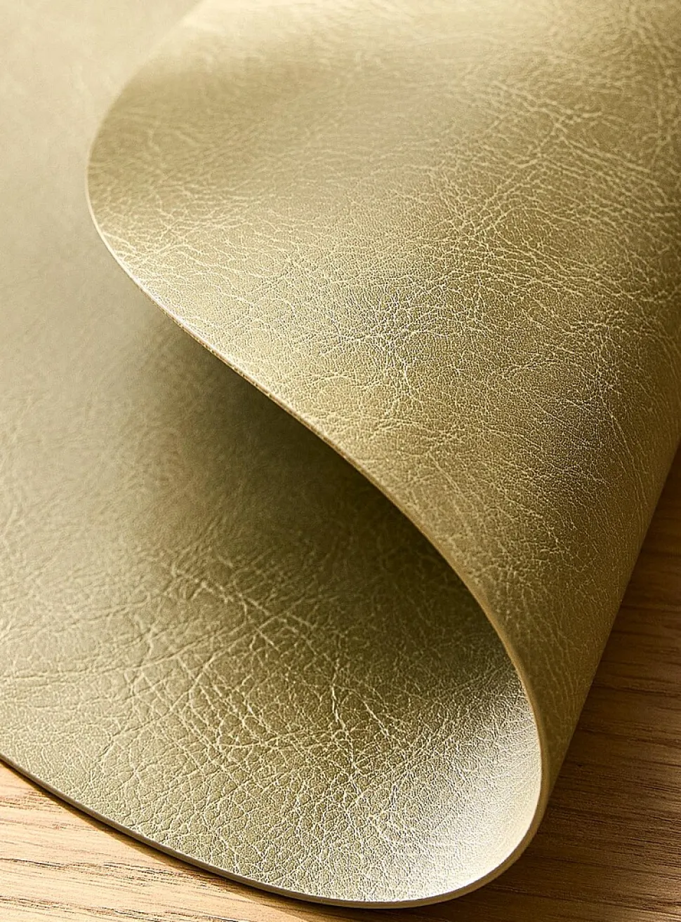 Round faux-leather placemat