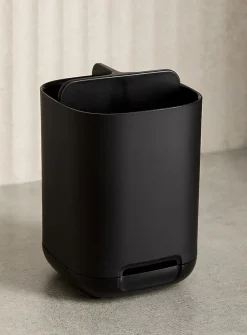 Small black toothbrush holder