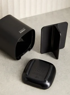 Small black toothbrush holder