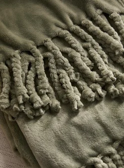 Solid soft plush fringed throw