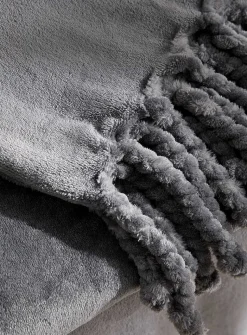 Solid soft plush fringed throw