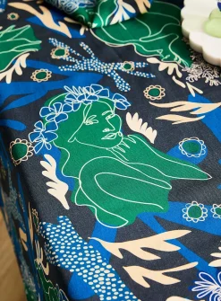 Tasselled colourful tablecloth
